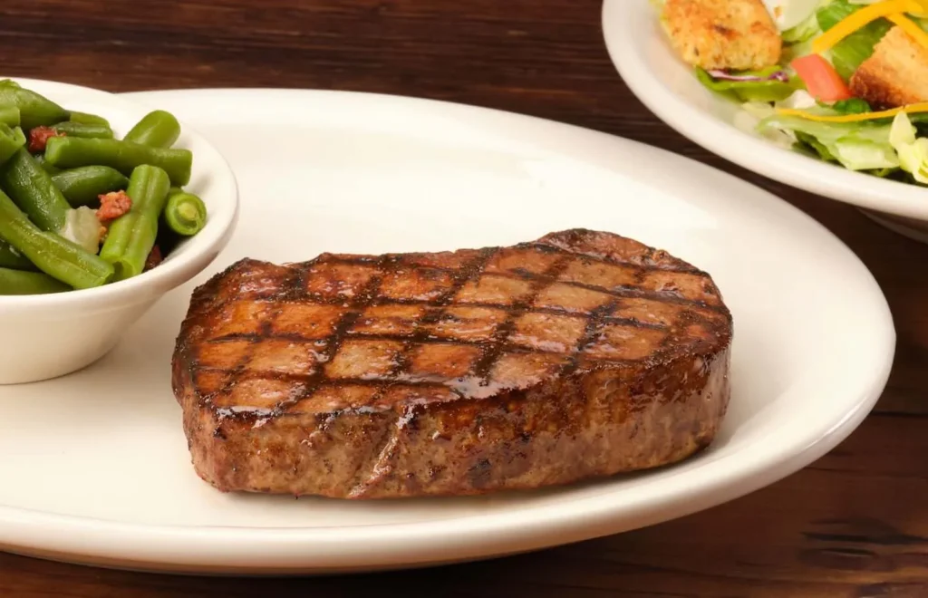 Meat with greens in texas roadhouse handcut menu